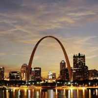 City,Of,St.,Louis,Downtown,With,Gateway,Arch,At,Twilight,
